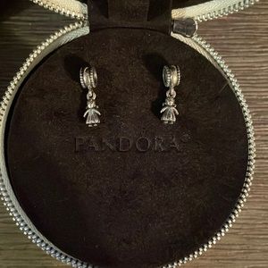 Two girl Pandora charms.